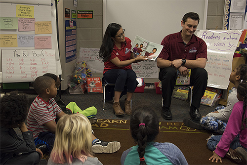 Reading to students in Classroom